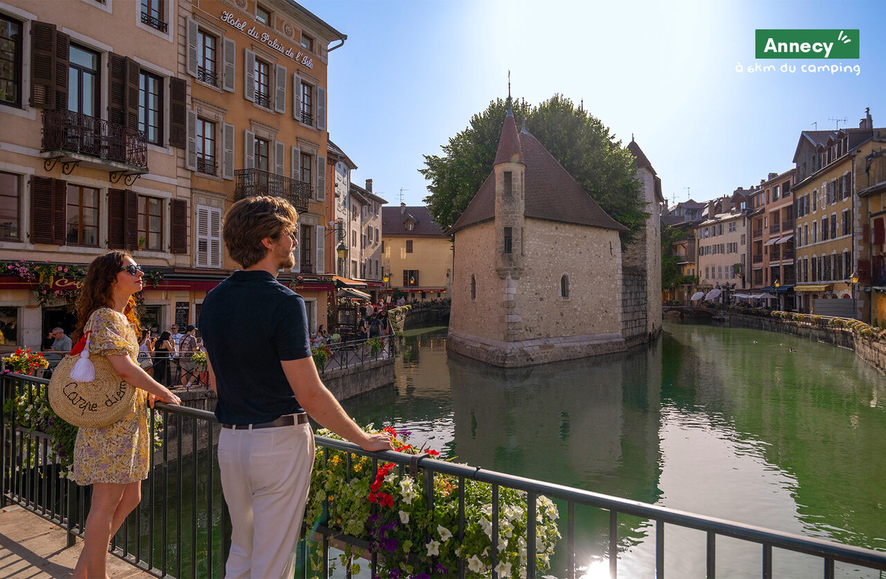 Palais de l'Isle and canal in Annecy, historic city in Haute-Savoie.