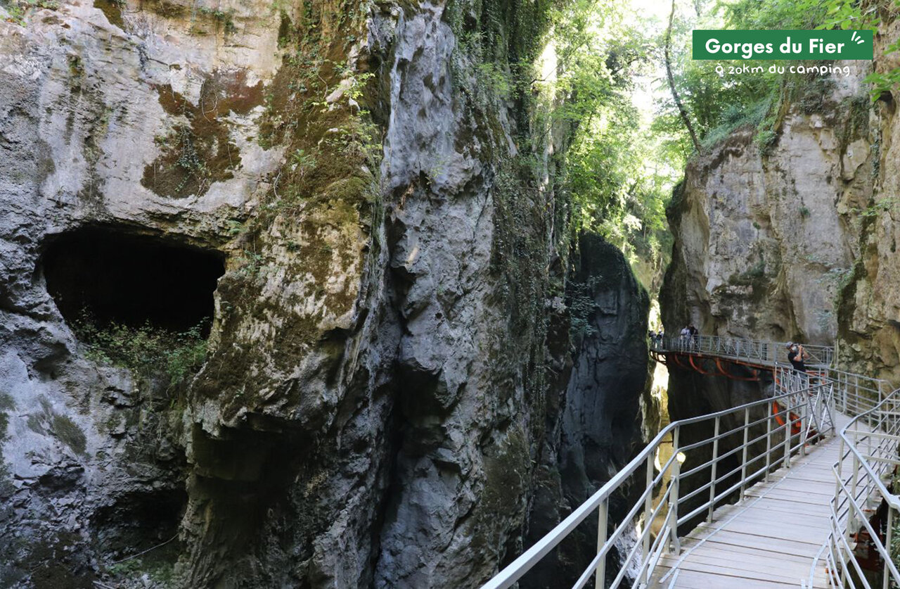 Gorges du Fier, suspended walkway between rocky cliffs near Annecy, Haute-Savoie.