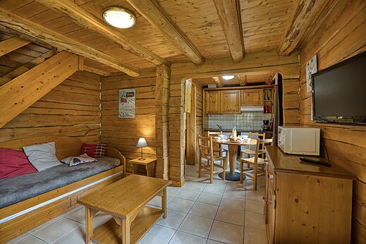 Wooden Mobil-home, living-kitchen at CLICOCHIC Alpes Lodges Pralognan la Vanoise.