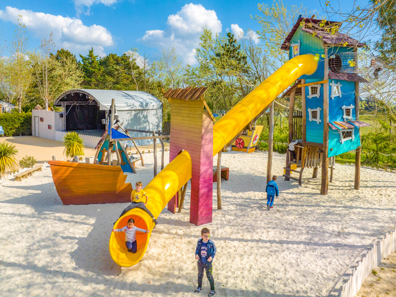 Giant slide, treehouse and children at CAPFUN Armor H�ol campsite in Piriac sur Mer.