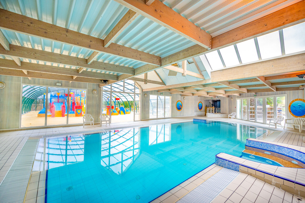Heated indoor pool and water games at CAPFUN Armor H�ol campsite in Piriac.