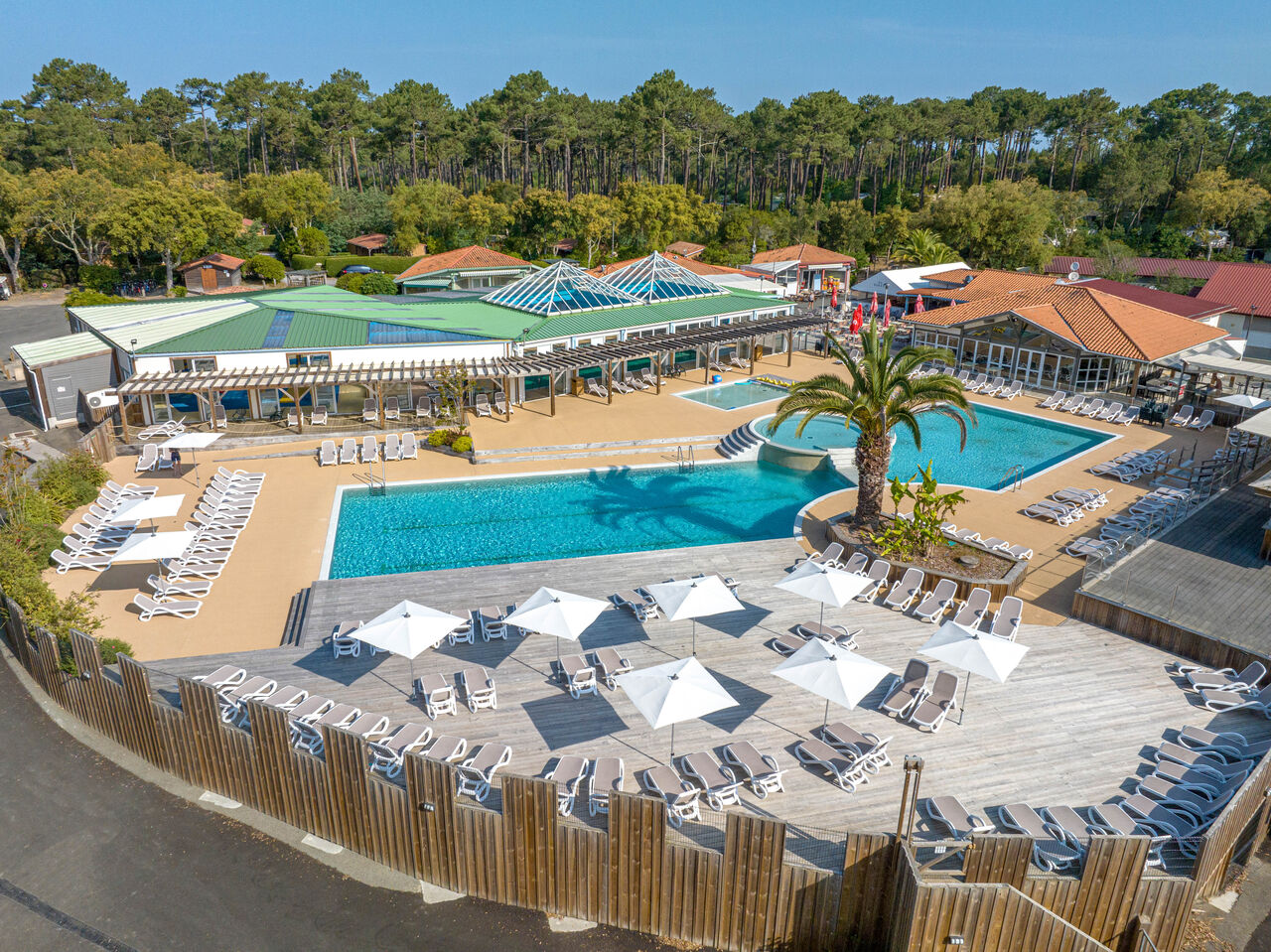 Outdoor pools and solarium at LIBRANOO Naturiste Arnaoutchot campsite in Veille-Saint-Girons, Landes, France. (40).