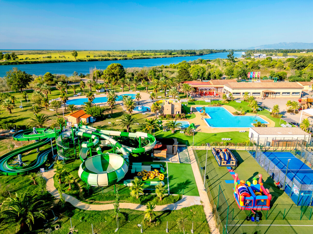 Aerial view of water park with giant slides at CAPFUN Aube campsite in Deltebre, Tarragona.