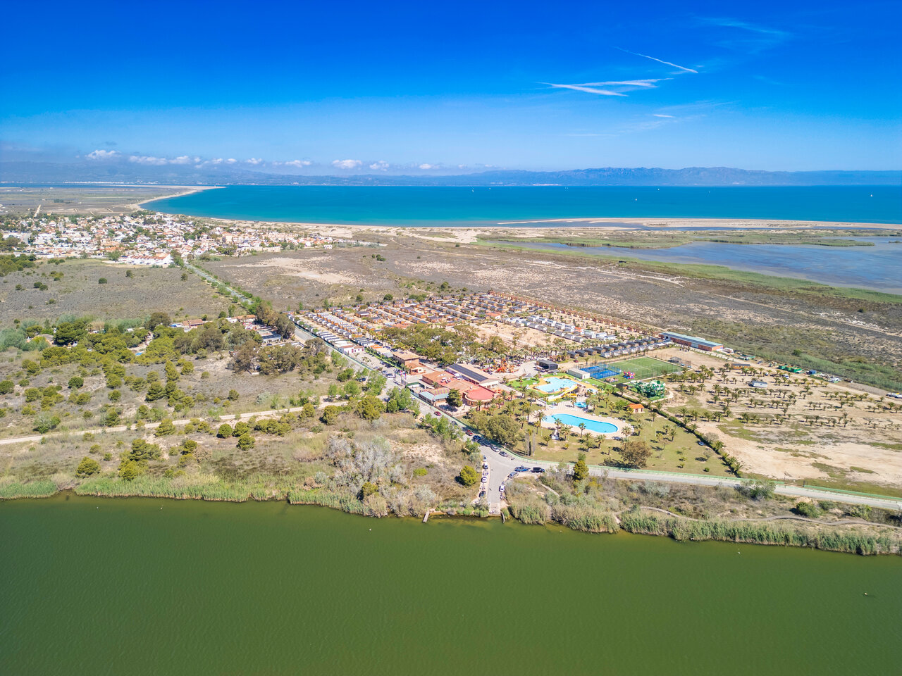 Camping CAPFUN Aube in Deltebre, Tarragona, aerial view, pools and accommodations.