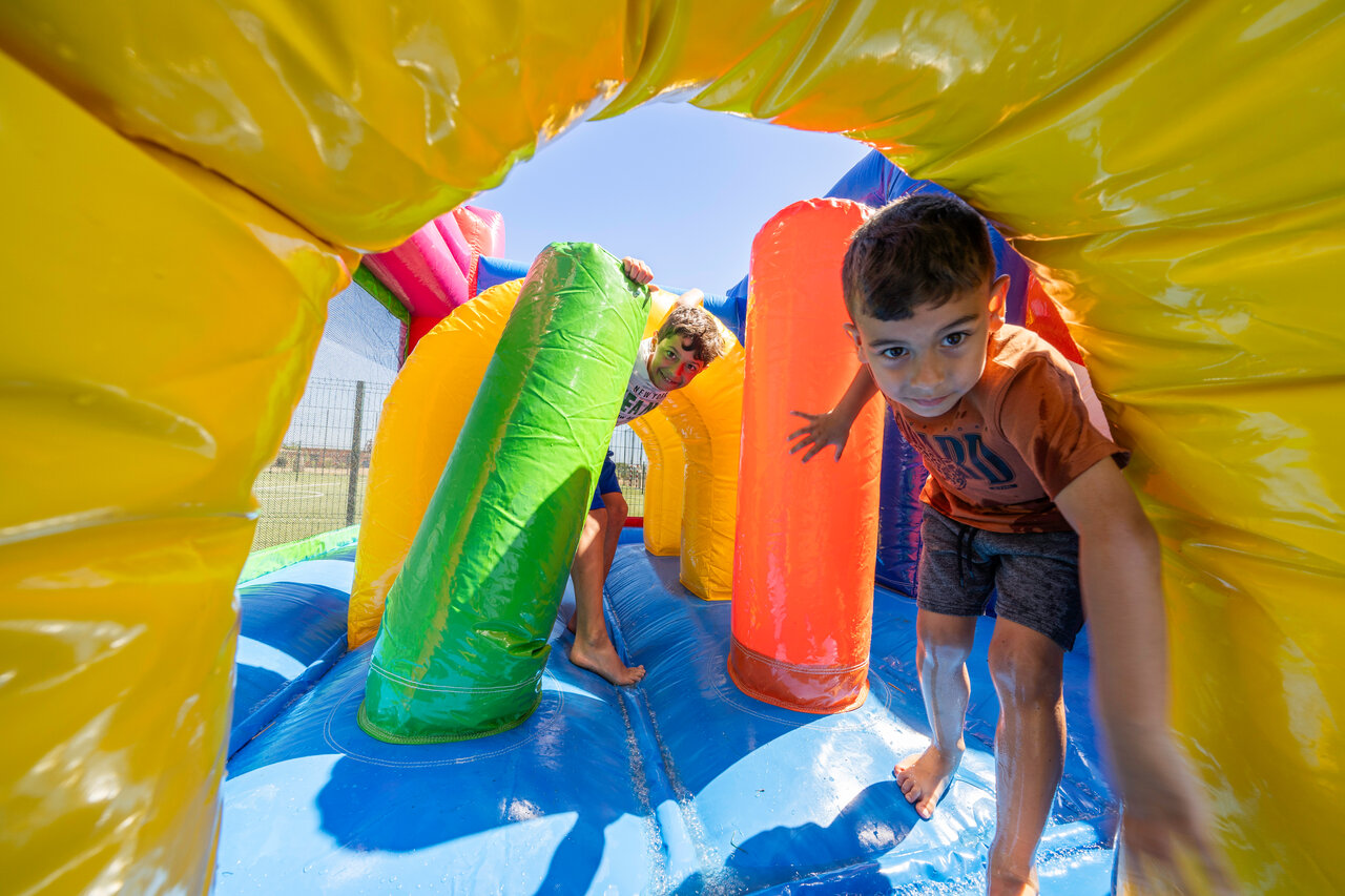 Colorful inflatable water game for children at CAPFUN Aube, Deltebre, Tarragona.