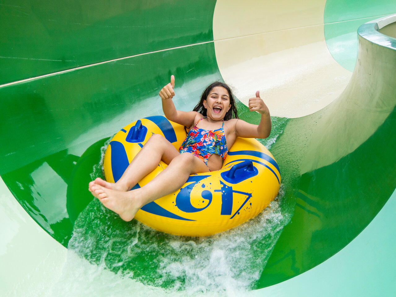 Child on tube water slide, CAPFUN Aube campsite, Deltebre, Tarragona (43).