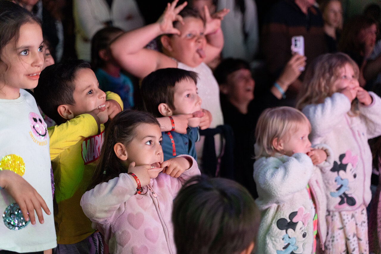 Captivated children watching animation at CAPFUN Aubr�des, Puget sur Argens (83).