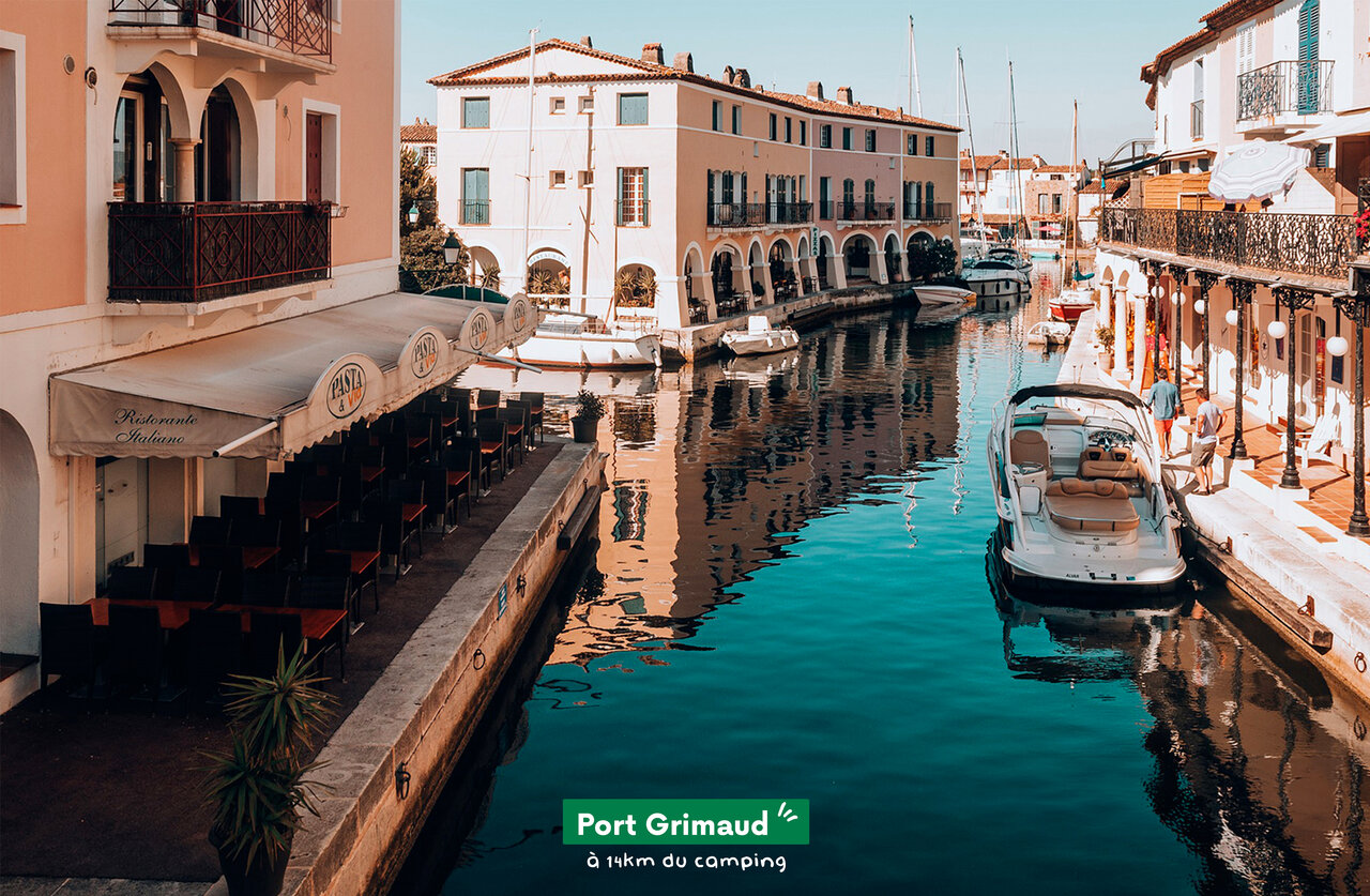 Port Grimaud, lakeside city with canals and boats, to visit near Cavalaire-sur-Mer.