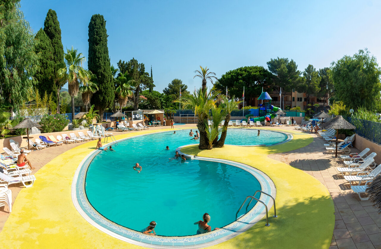 Swimming pools, playground at CLICOCHIC Baie de Cavalaire campsite in Cavalaire-sur-Mer (83).