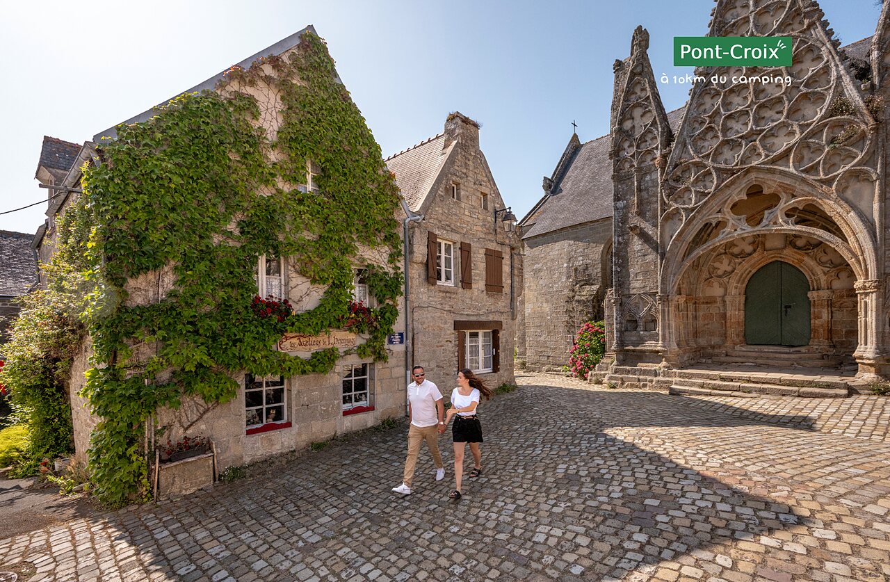 Historic cobbled street and church in Pont-Croix, Finist�re, a place to visit.