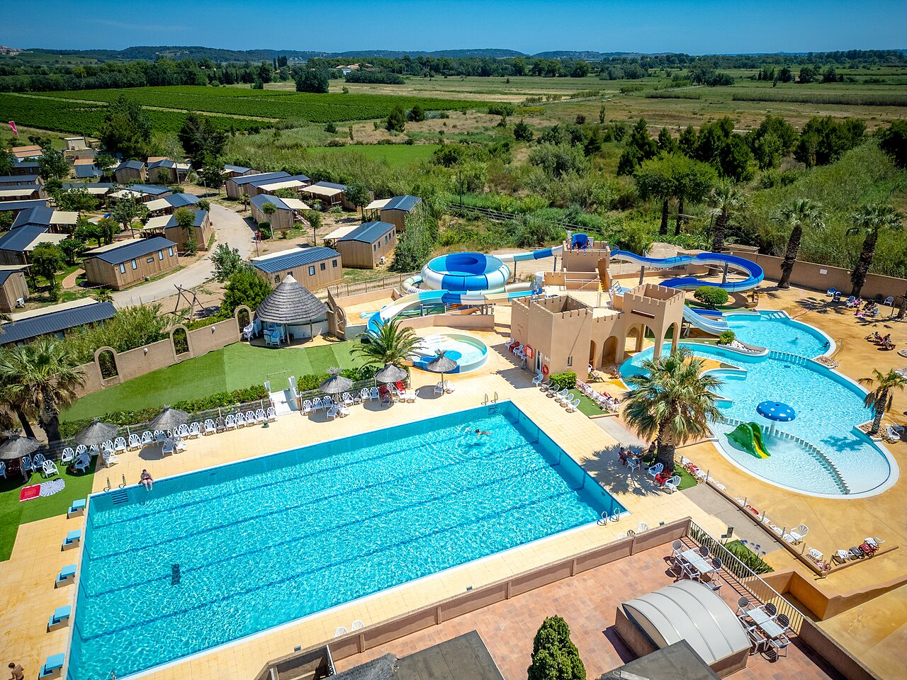 Large water park, slides and pools, aerial view CAPFUN Barbacane NARBONNE (11).