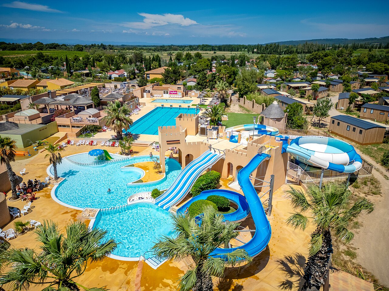 Water park with giant slides, outdoor pools at CAPFUN Barbacane campsite in NARBONNE (11).