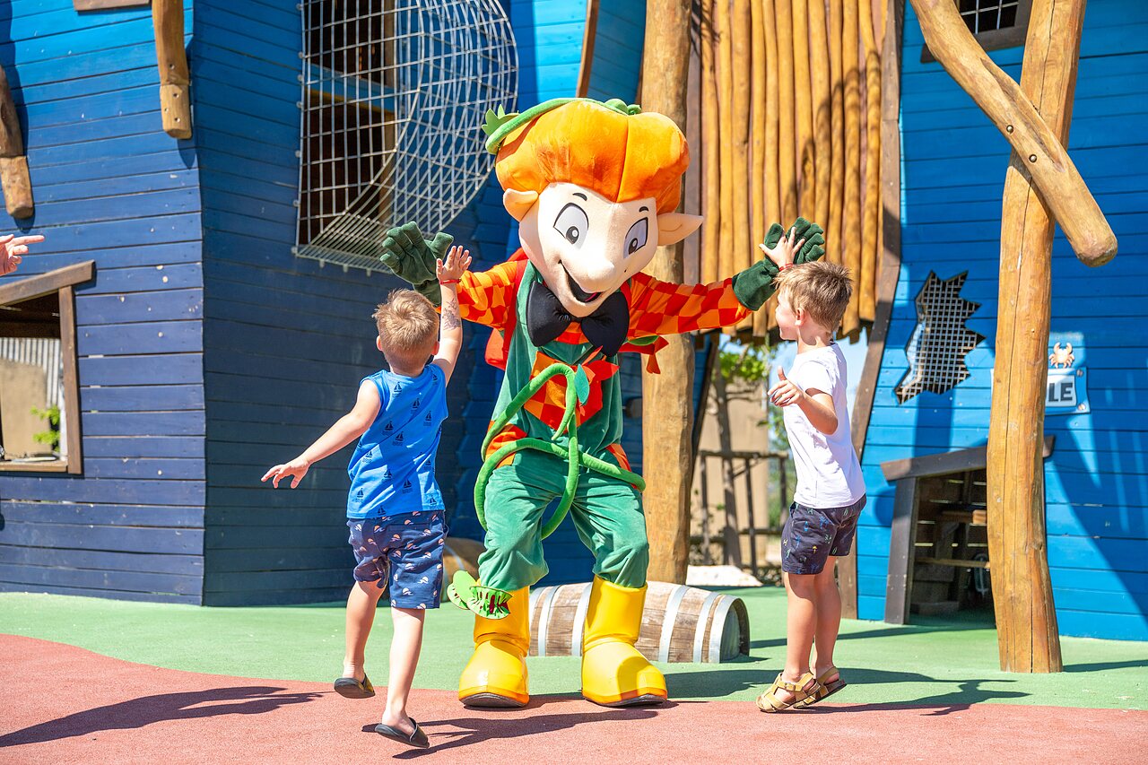 Capfun mascot and children playing in animation area at CAPFUN Barbacane campsite in NARBONNE (11).