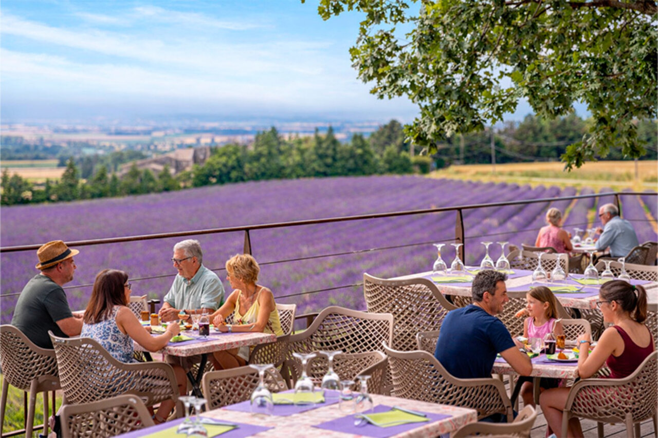 Terrace restaurant, lavender field view, camping CLICOCHIC Bastets in Marsanne.