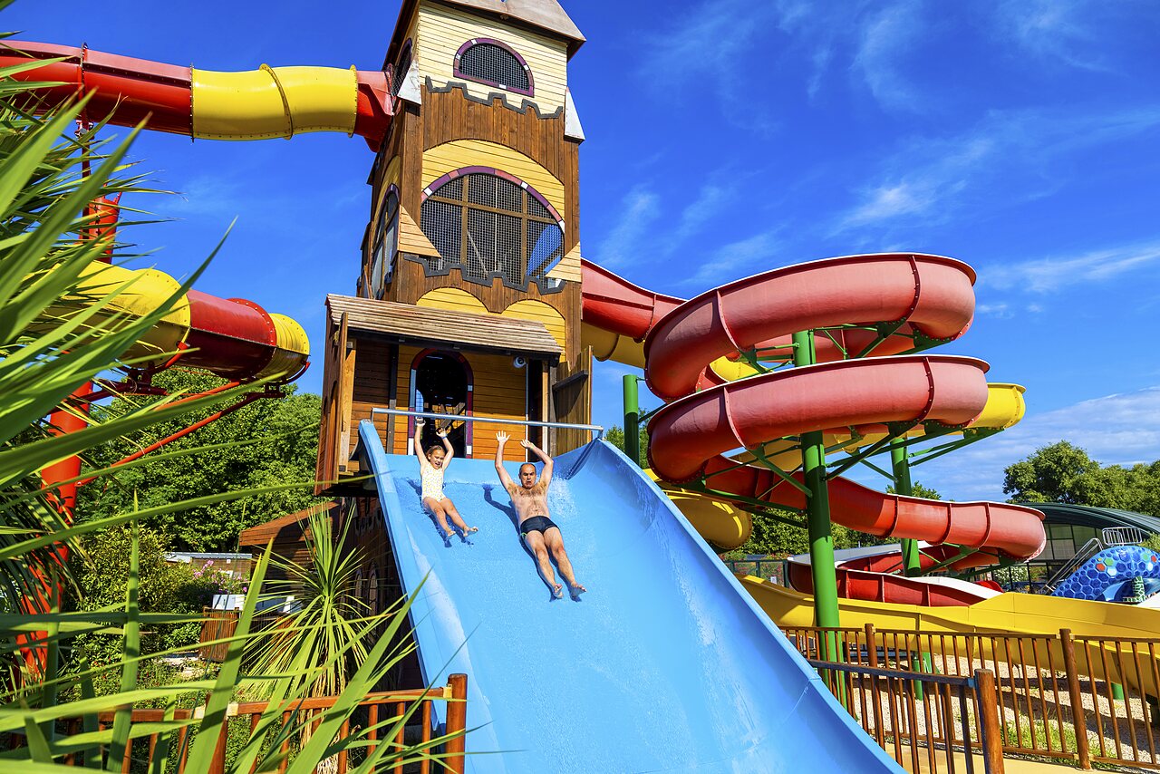 Children on giant water slide at CAPFUN Bastide campsite in N�mes (30).