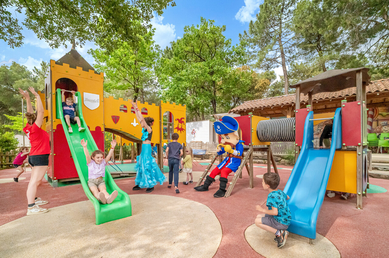 Playground, slides, children and animators at CAPFUN Beauregard MORNAS (84).