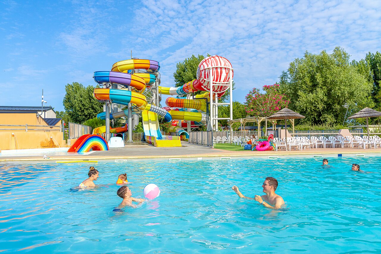 Outdoor swimming pool, water slides at CAPFUN Bel Air campsite in Aiguillon sur Mer.