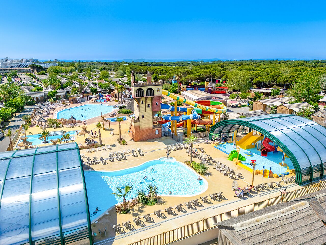 Swimming pools, slides at CAPFUN Boucanet campsite in LE GRAU DU ROI (30).