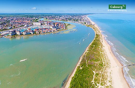 Aerial view of Cabourg, its estuary, the beach, and the marina.