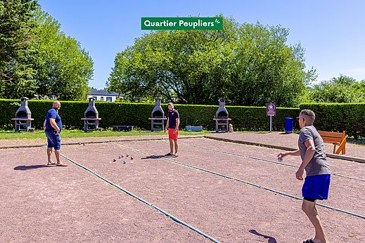 Petanque court and barbecues at CLICOCHIC Brise de Cabourg campsite.