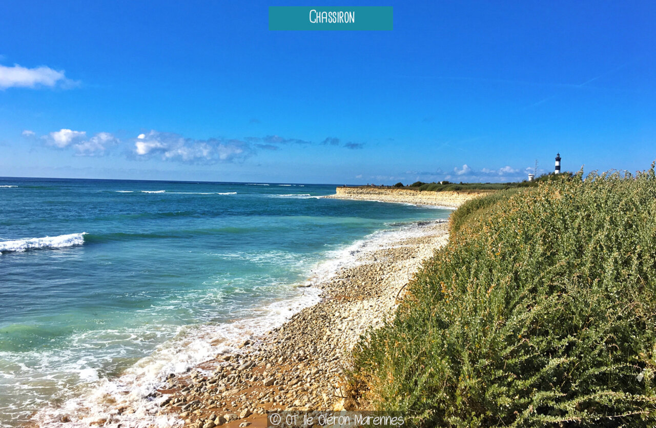Chassiron Lighthouse and pebble beach on Ol�ron island, Charente-Maritime.