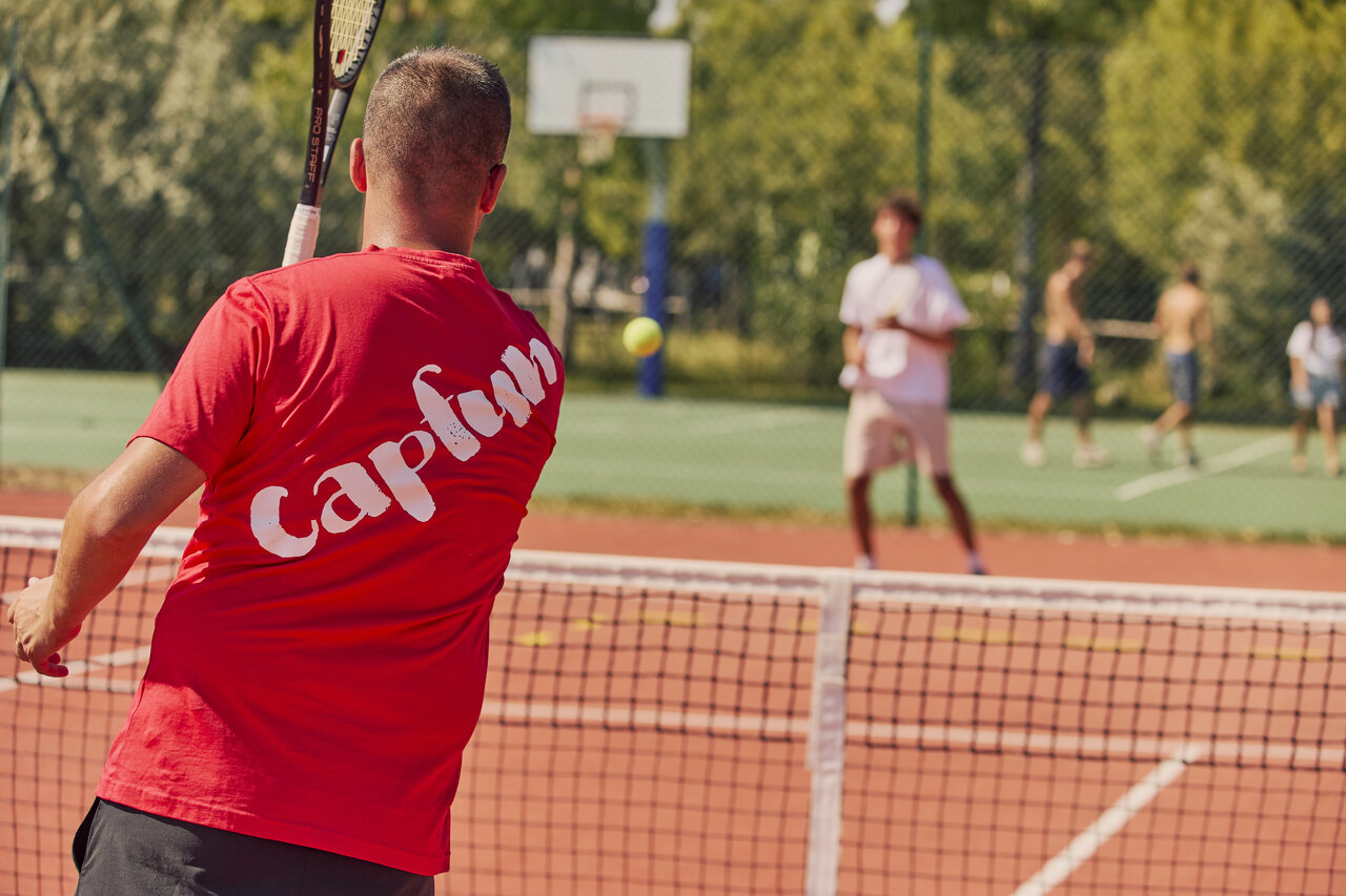 Tennis on court at CAPFUN Campo dei Fiori campsite in Rosignano Marittimo.