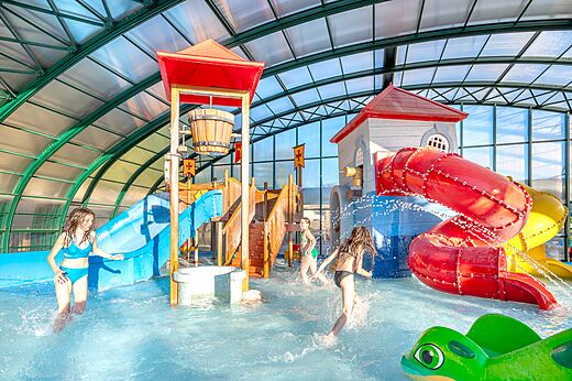 Indoor pool, slides, water games at CAPFUN Carpe Diem in VAISON LA ROMAINE.