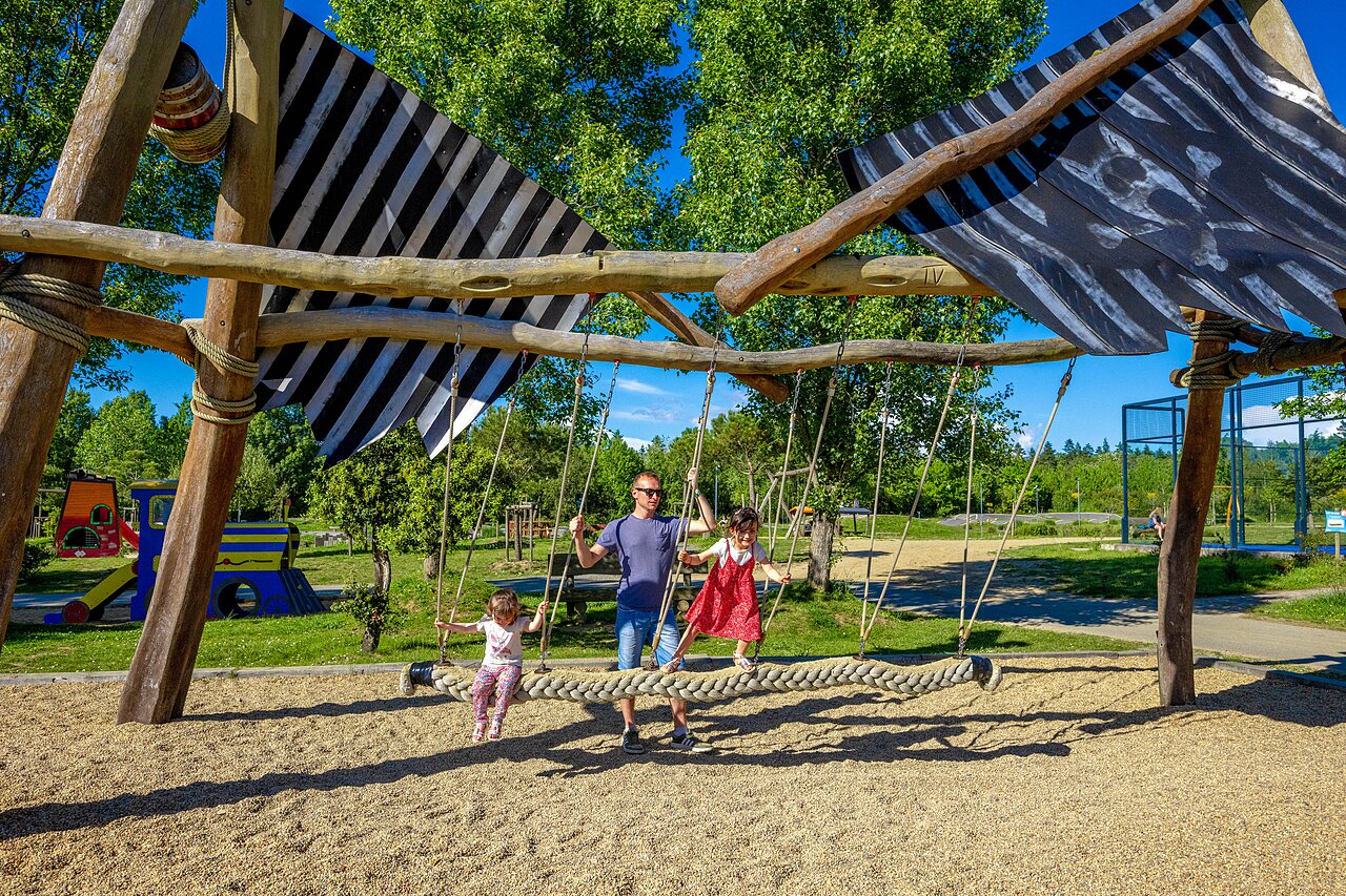 Rope swing, children at CAPFUN Cenic campsite in PENESTIN (56).