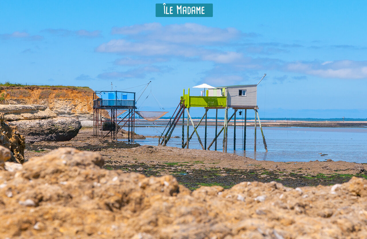 Traditional fishing huts on stilts at �le Madame, a place to visit near Saint-Laurent-de-la-Pr�e.