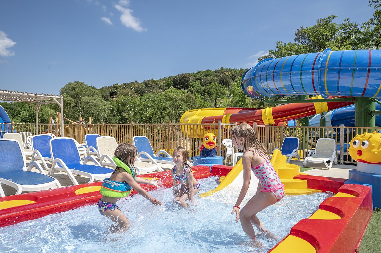 Kids' pool, water games, slides at CLICOCHIC Ch�teau de Boisson in All�gre-les-Fumades.