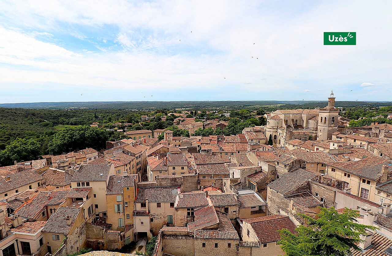 Panoramic view of Uz�s rooftops and its cathedral, historic city in the Gard.