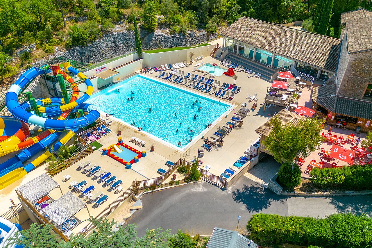 Outdoor pool, giant waterslides at CLICOCHIC Ch�teau de Boisson campsite (30).