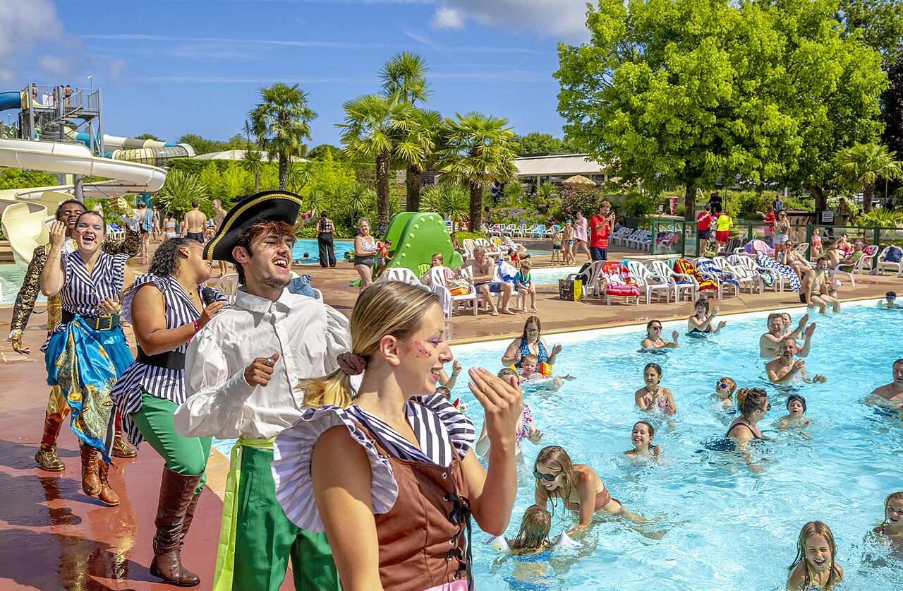 Pirate entertainment and outdoor pool with slides at CAPFUN Ch�teau de Galin�e.