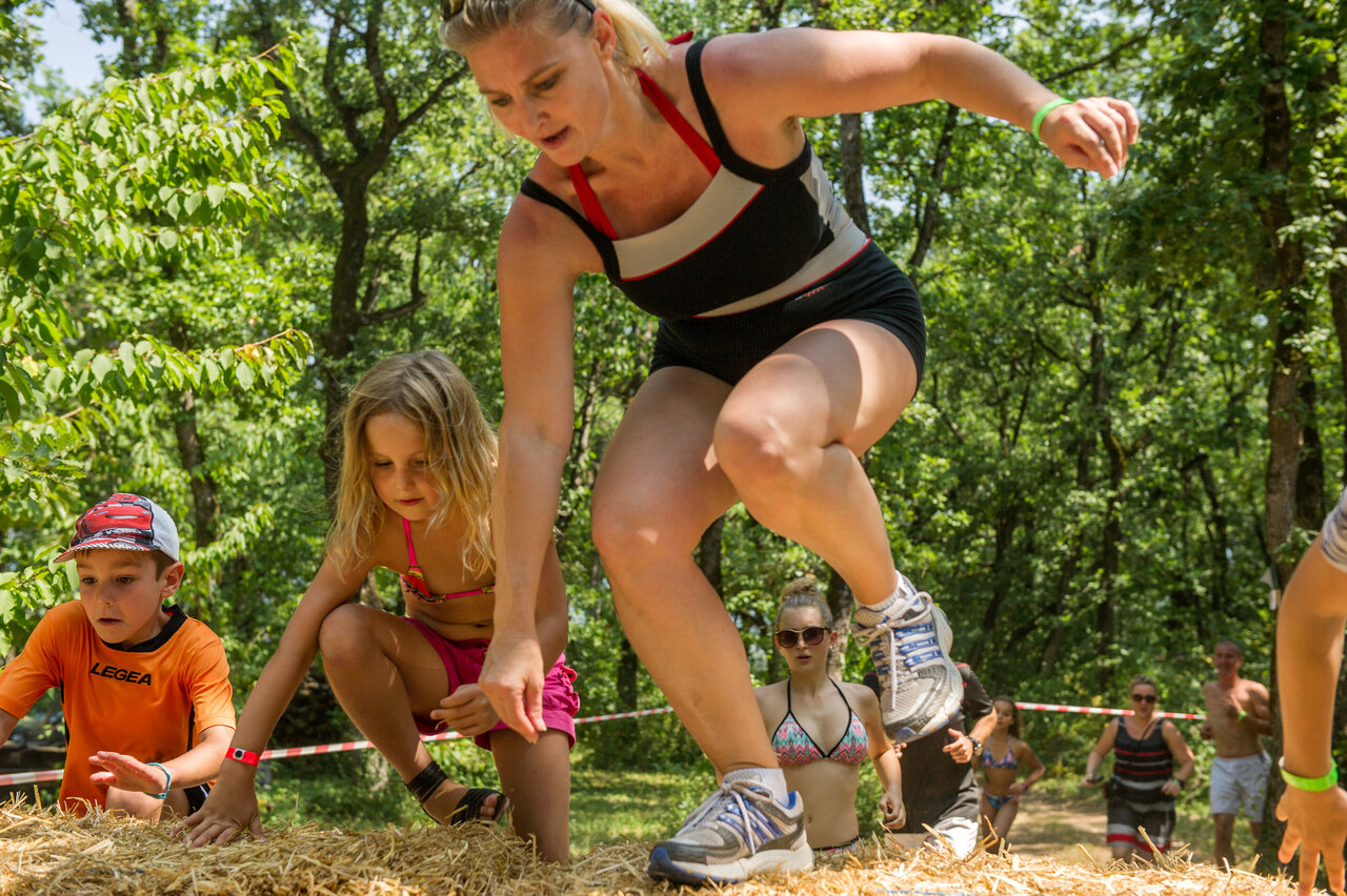 Family obstacle course with hay bales at CAPFUN Ch�nes campsite in Medis/Royan.