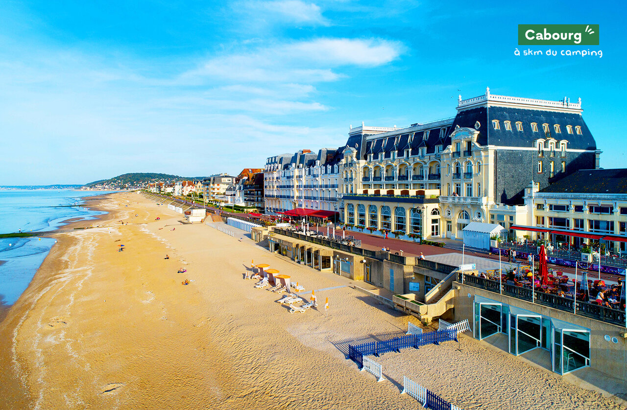 Fine sandy beach and elegant seafront in Cabourg, Normandy.