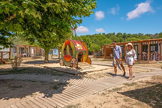 Original playground and Mobile homes at CLICOCHIC Chouans campsite in SAINT HILAIRE DE RIEZ