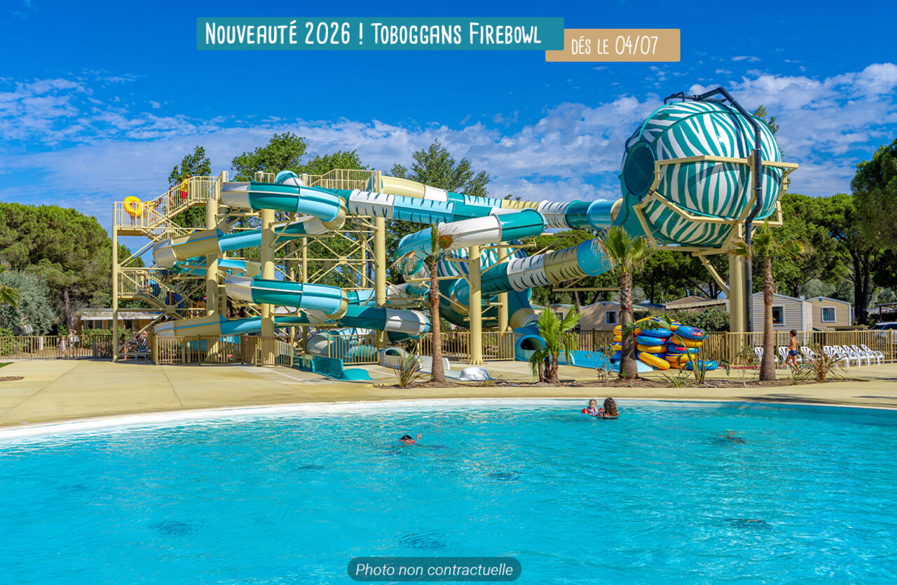 Firebowl water slides and outdoor pool at VAGUES OCEANES Les Cigales campsite.