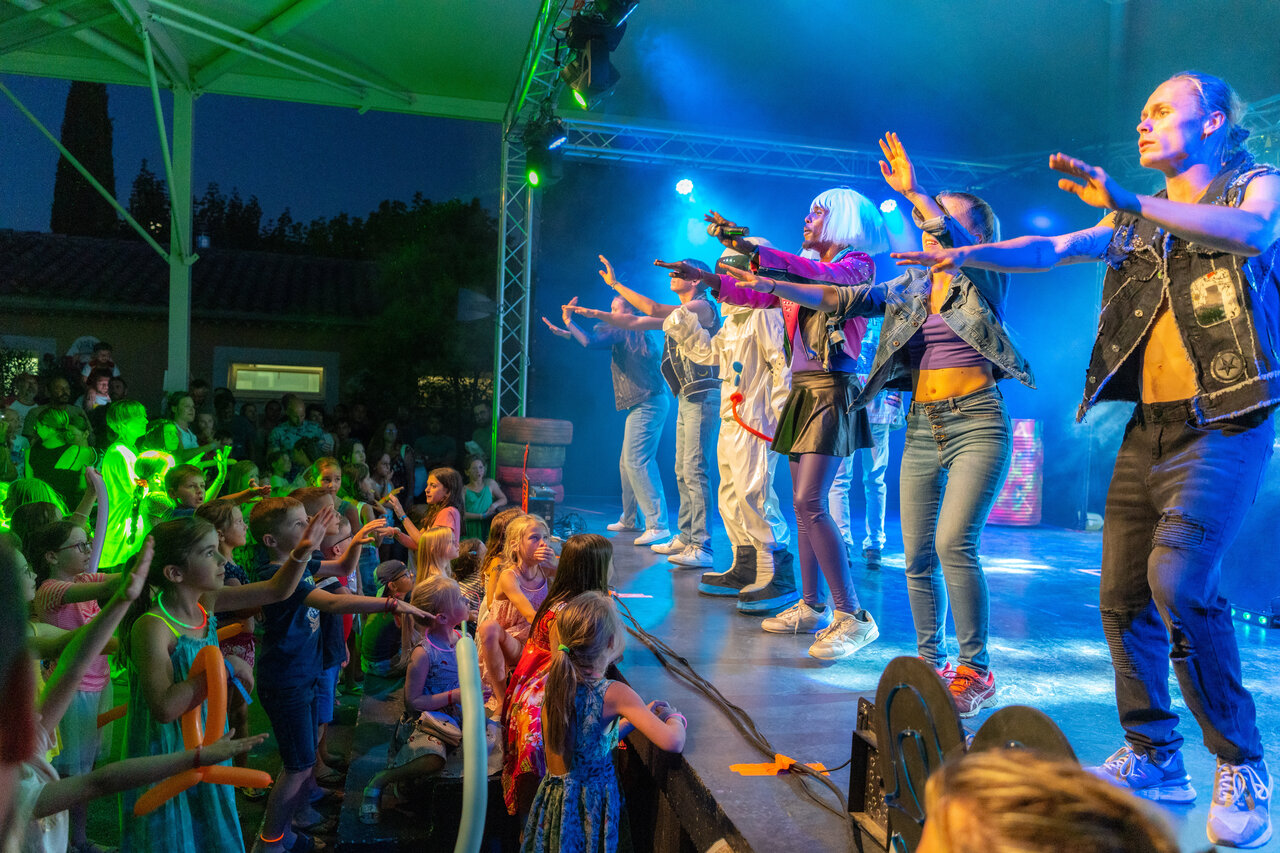 Evening animation show for children at CAPFUN Citadelle de Loustic campsite.