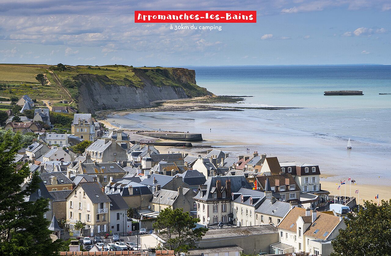 Arromanches-les-Bains, historic coastal town with beach and cliffs in Normandy.