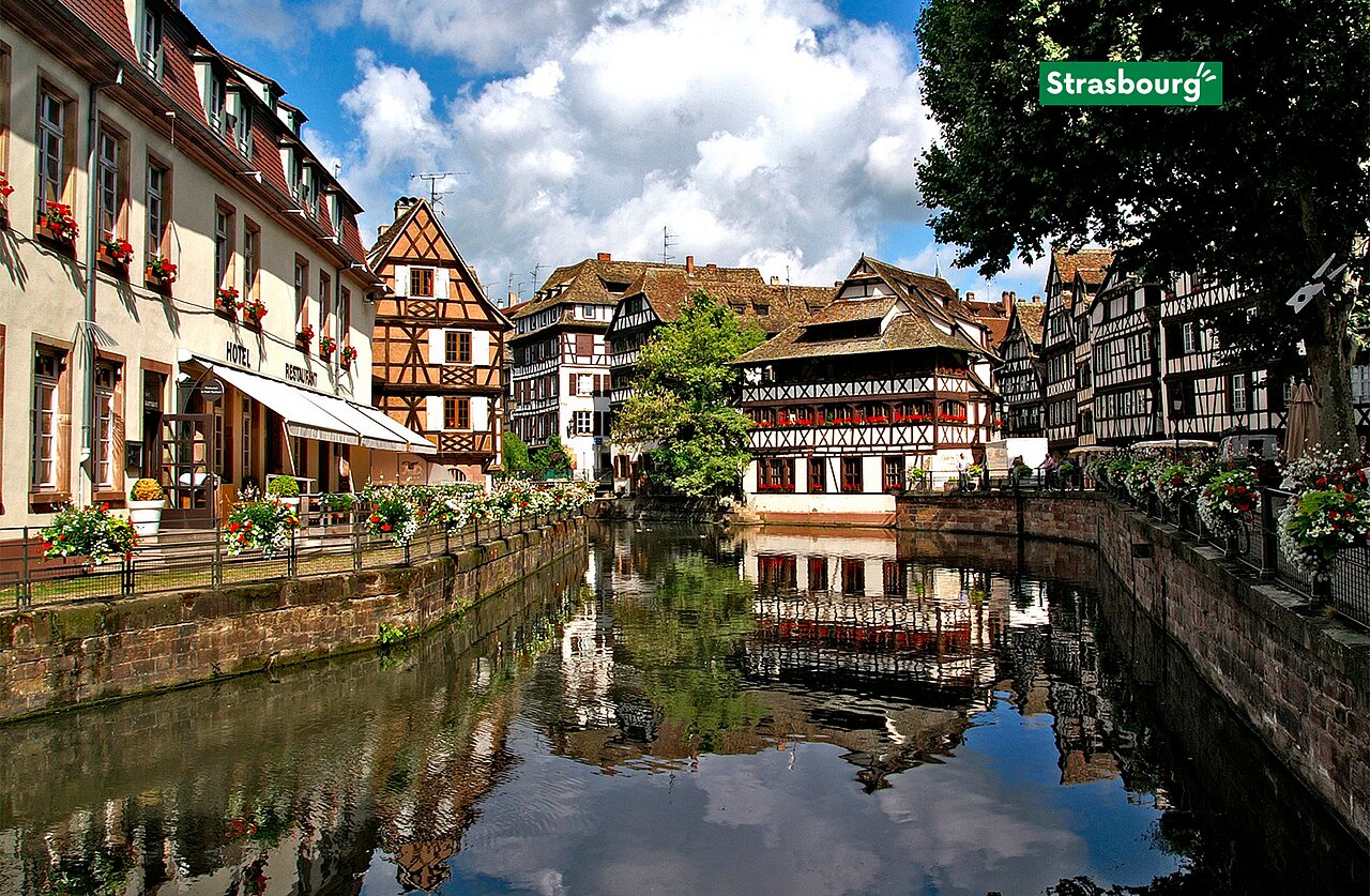 Half-timbered houses and canal of Petite France quarter in Strasbourg, Alsace.