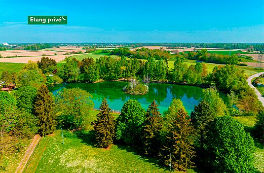 Private green pond, aerial view, camping CLICOCHIC Au Clair Ruisseau Gerstheim (67).
