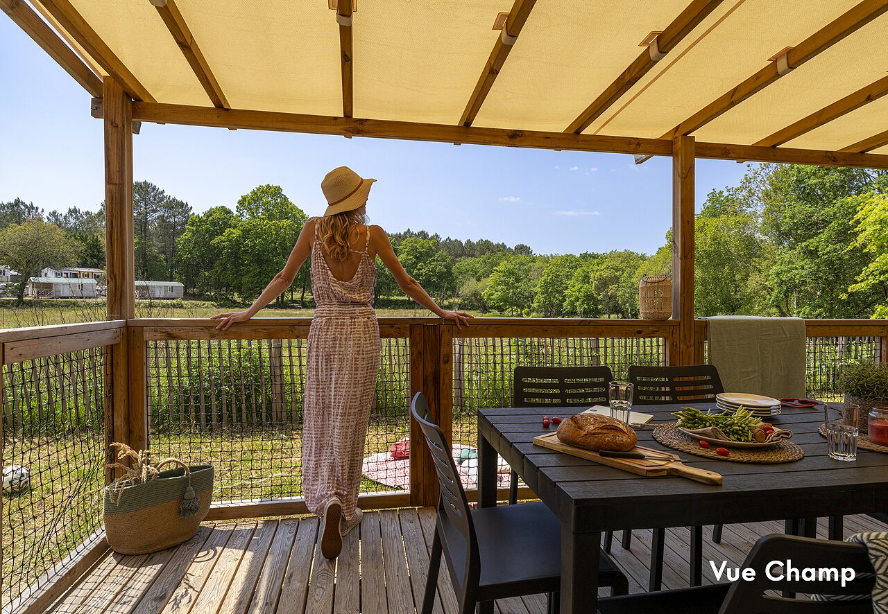 Woman on accommodation terrace, nature view, CAPFUN Clown Oc�an, TOSSE (40).