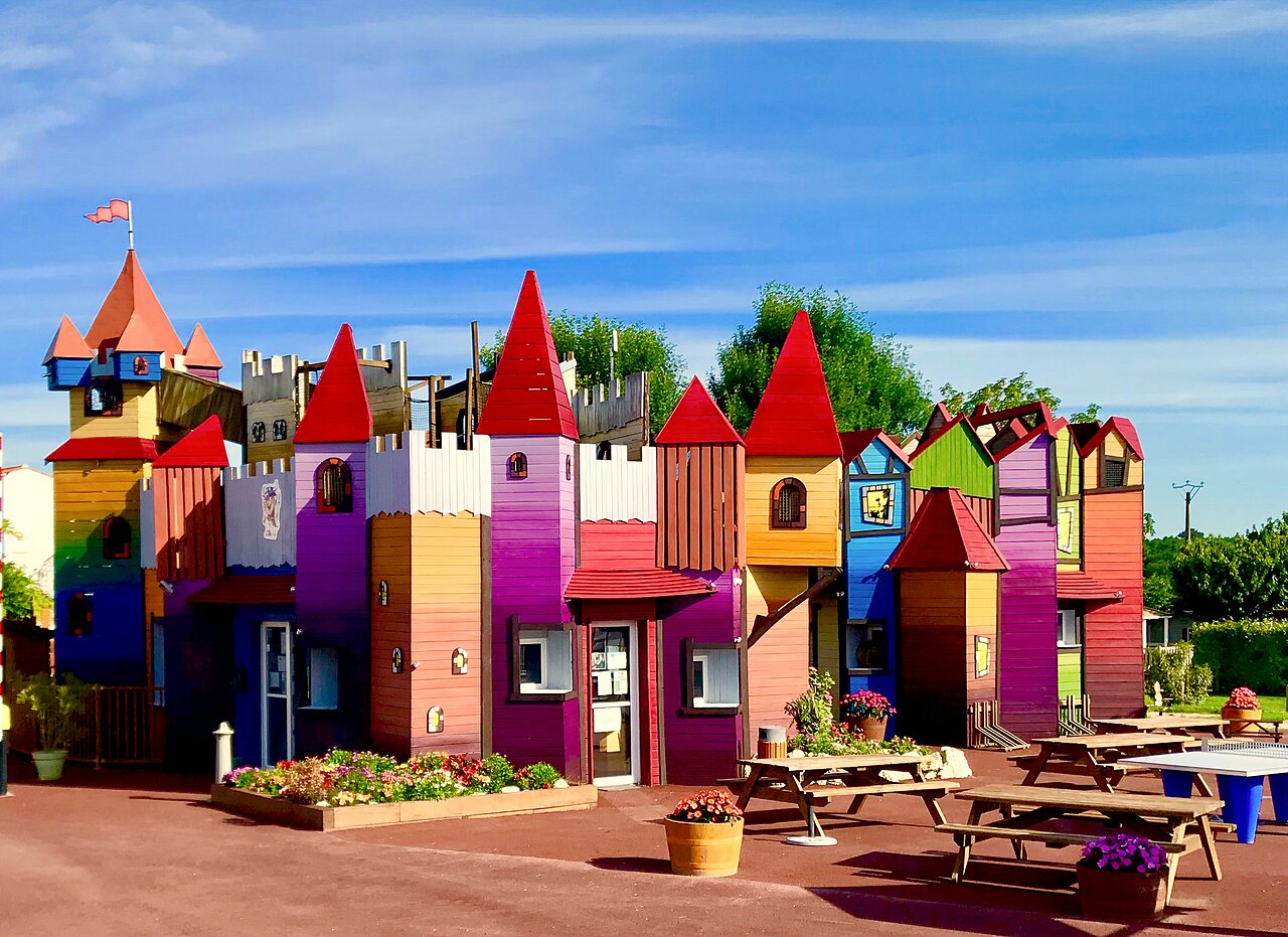 Colorful children's play castle at CAPFUN Coquelicots campsite in Royan (17).