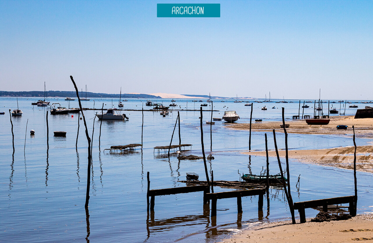 Arcachon Bay, traditional boats and Dune du Pilat, a place to visit.