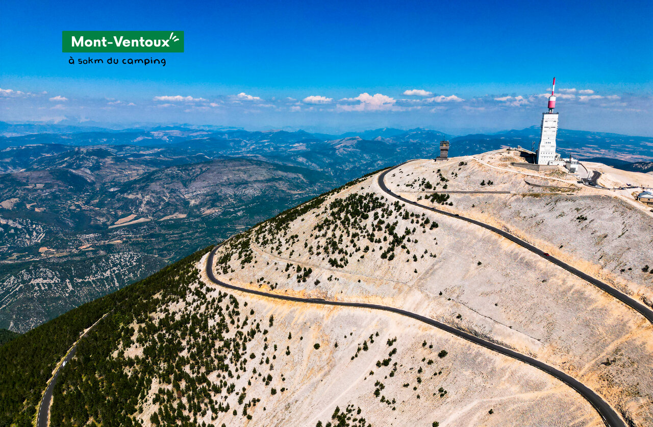 Mont Ventoux, iconic summit with observatory, winding road in Provence.