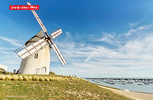 La Conche windmill and marina in Jard-sur-Mer, Vend�e, France.