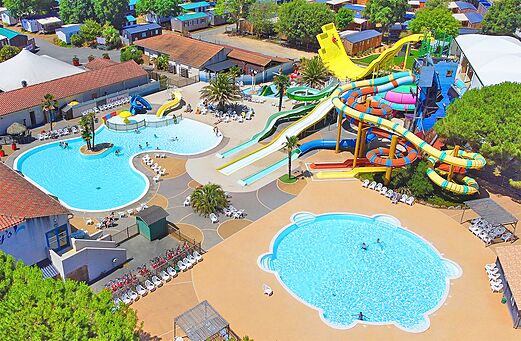 Outdoor swimming pool with giant water slides at CAPFUN Curty's campsite in Jard sur Mer (85).