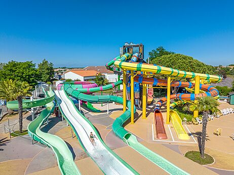 Colorful water slides and outdoor pool at CAPFUN Curty's campsite in Jard sur Mer (85).
