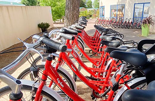 Red bicycles for rent at CAPFUN Curty's campsite in Jard sur Mer (85).
