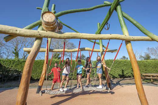 Children's playground at CAPFUN Dauphins Bleus campsite in GIVRAND (85).